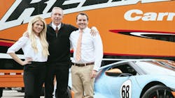 Tom Abrams, Reliable Carriers' owner, with his daughter Lauren and son Brian. Tom Abrams, Reliable Carriers' owner, with his daughter Lauren and son Brian.