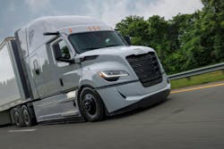 A look at the passenger side of the fifth generation Cascadia sleeper tractor-trailer operating on the road. A look at the passenger side of the fifth generation Cascadia sleeper tractor-trailer operating on the road.