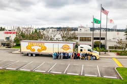 Alabama band and crew pose in front of the Kenworth Renton plant Alabama band and crew pose in front of the Kenworth Renton plant