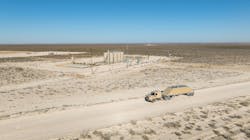 An Atlas Energy Solutions-owned Kodiak RoboTruck hauls proppant fracking material in the Permian Basin. An Atlas Energy Solutions-owned Kodiak RoboTruck hauls proppant fracking material in the Permian Basin.
