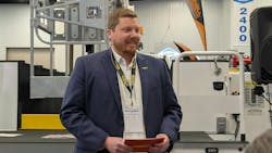 Chris Shallenberg showcasing new cable placer at Work Truck Week. Chris Shallenberg showcasing new cable placer at Work Truck Week.