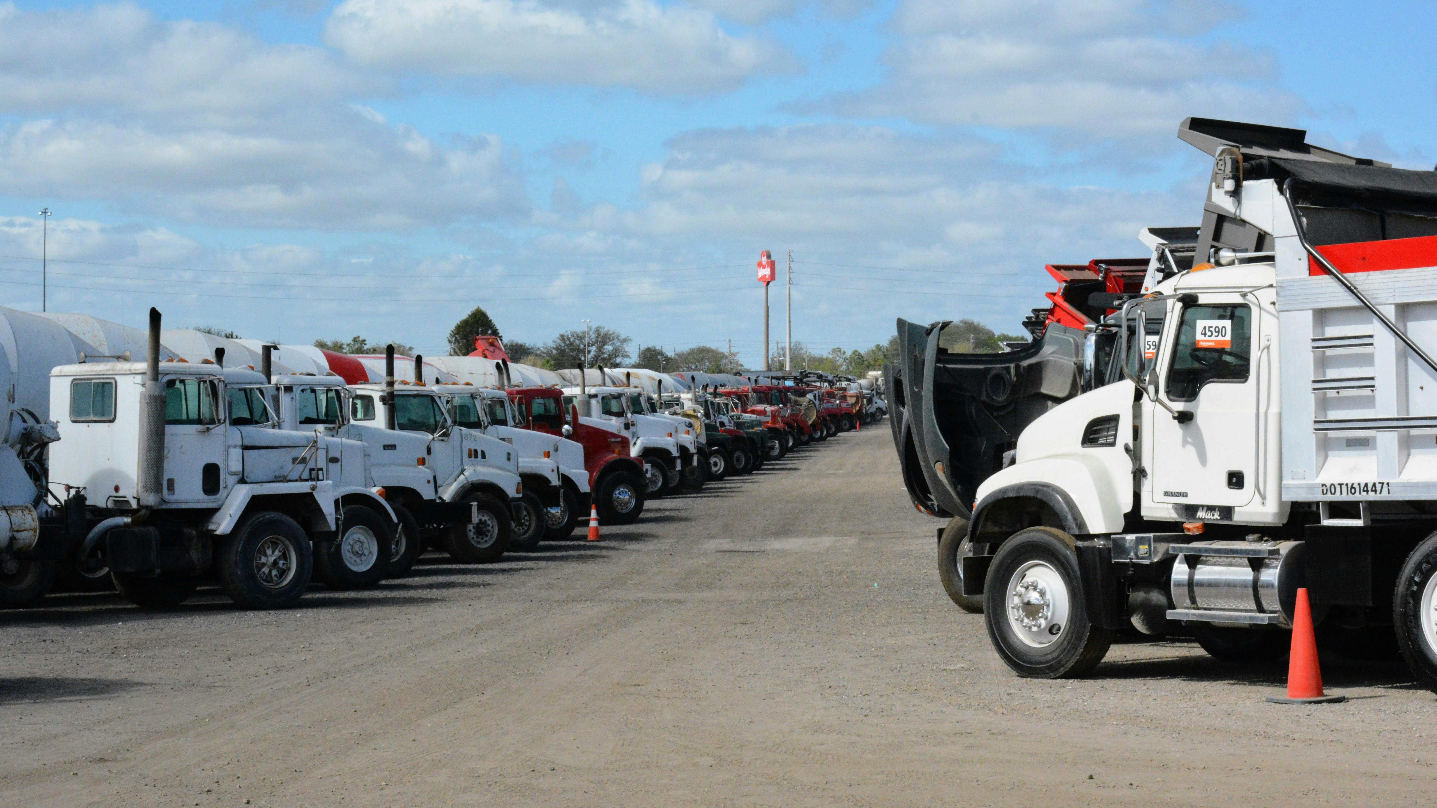Used trucks lined up for Ritchie Bros. auction in Flordia.
