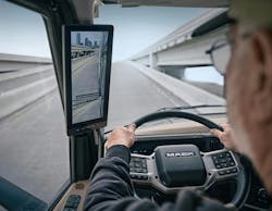 Mack's first digital mirror system, an option on the Pioneer, replaces traditional side mirrors with cameras housed in pods on top of the sleeper. This system provides better vantage points for drivers by eliminating blind spots while improving fuel efficiency. The digital mirror offers about 1% in fuel savings for fleets. Mack's first digital mirror system, an option on the Pioneer, replaces traditional side mirrors with cameras housed in pods on top of the sleeper. This system provides better vantage points for drivers by eliminating blind spots while improving fuel efficiency. The digital mirror offers about 1% in fuel savings for fleets.