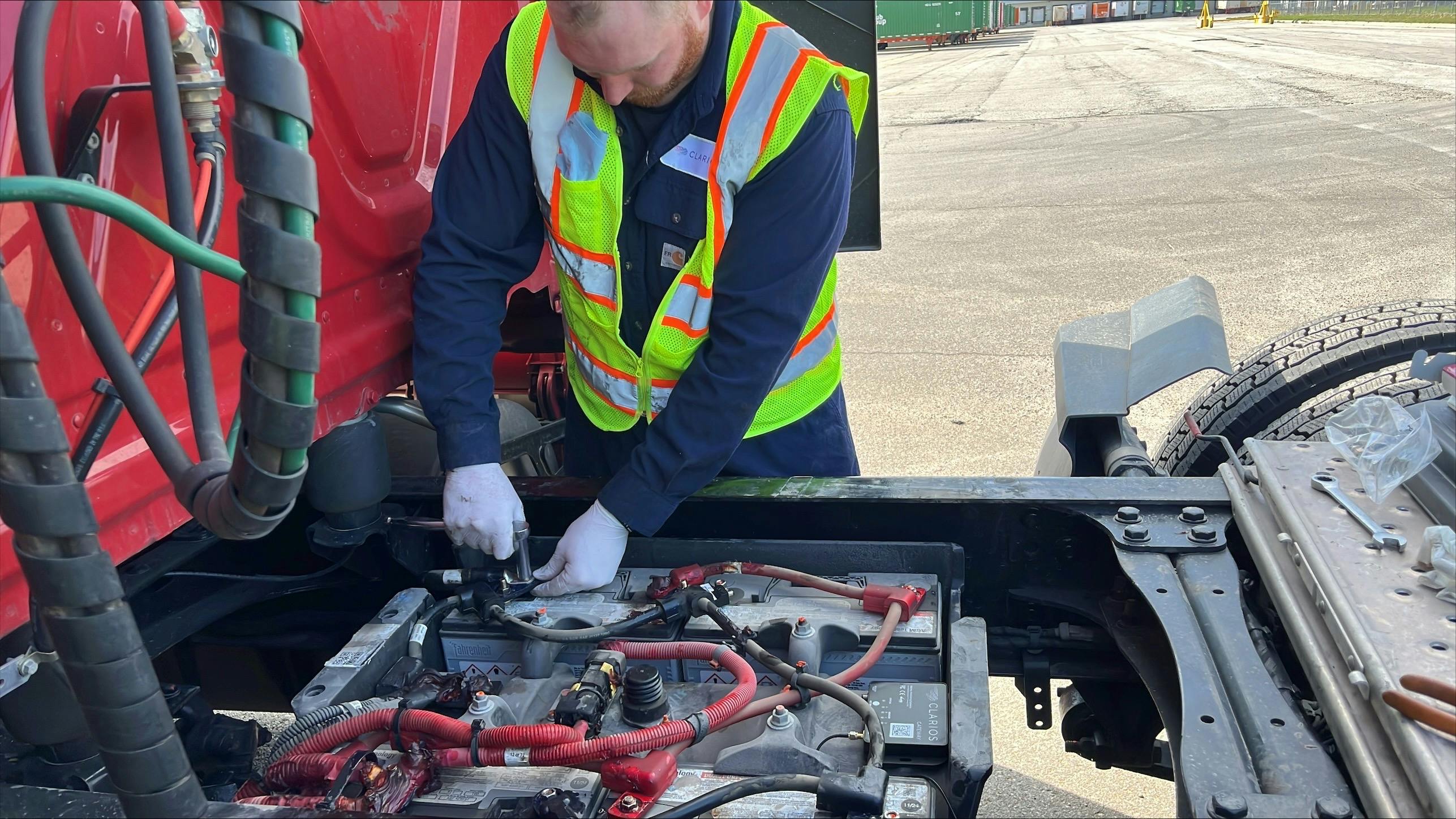 A technician installs the IdleLess hardware on a truck.
