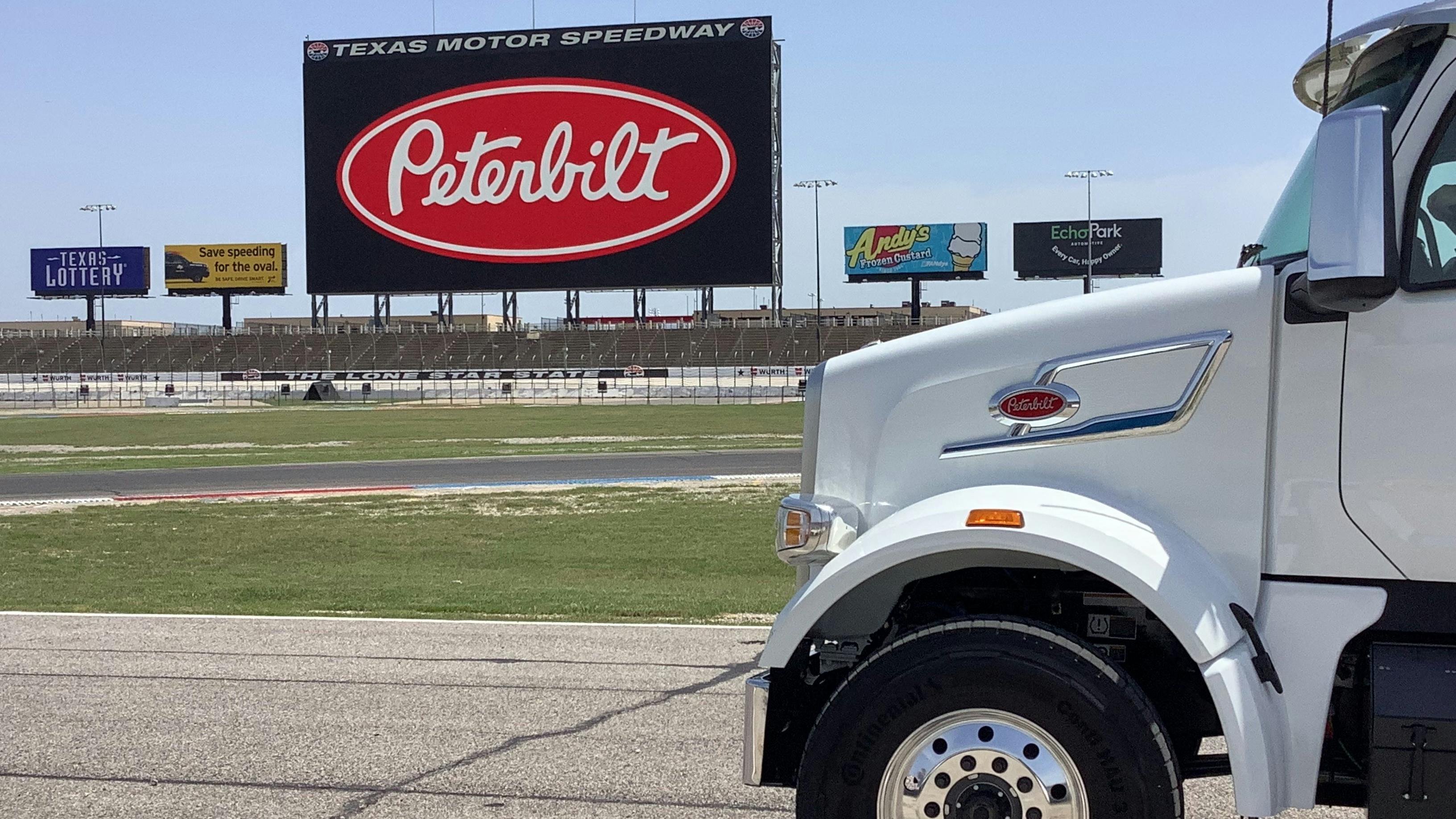 The new Peterbilt Model 567EV rolls into the Texas Motor Speedway in Fort Worth, Texas, before debuting at ACT Expo in Anaheim, California, on April 28.