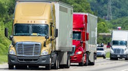 Conventional cab trucks on highway Conventional cab trucks on highway