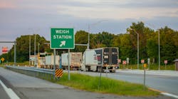 Semi trucks line up at a weigh station outside Joplin, Missouri. During International Roadcheck, thousands of commercial vehicles will be inspected by enforcement officers across North America. Semi trucks line up at a weigh station outside Joplin, Missouri. During International Roadcheck, thousands of commercial vehicles will be inspected by enforcement officers across North America.