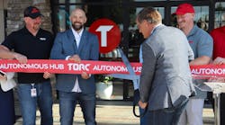 Torc CEO Peter Schmidt cuts a ceremonial ribbon during the official grand opening of the company's first autonomous trucking hub in Fort Worth, Texas. Torc CEO Peter Schmidt cuts a ceremonial ribbon during the official grand opening of the company's first autonomous trucking hub in Fort Worth, Texas.