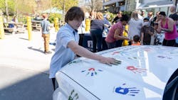 The Handprint Ceremony is a signature event of Hyundai Hope on Wheels, inviting children and families impacted by cancer to leave their handprints on the Hyundai Hope car, symbolizing the shared strength and resilience in the fight against paediatric cancer. The Handprint Ceremony is a signature event of Hyundai Hope on Wheels, inviting children and families impacted by cancer to leave their handprints on the Hyundai Hope car, symbolizing the shared strength and resilience in the fight against paediatric cancer.