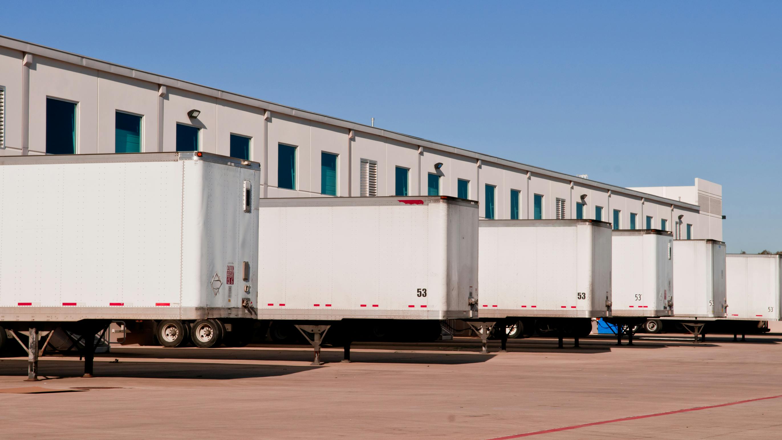 trailers in a warehouse lot