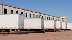 trailers in a warehouse lot trailers in a warehouse lot