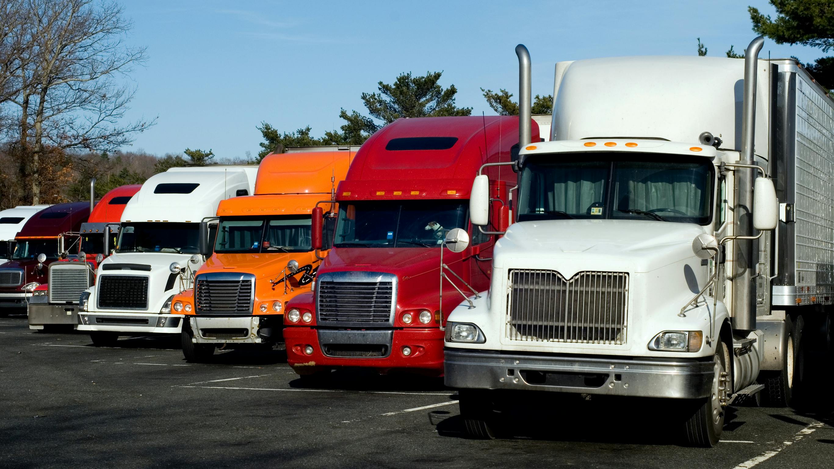 line of long-haul trucks