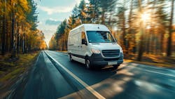electric cargo van driving in summertime electric cargo van driving in summertime
