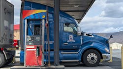 A semi truck stops to refuel at a travel center in Ohio. A semi truck stops to refuel at a travel center in Ohio.