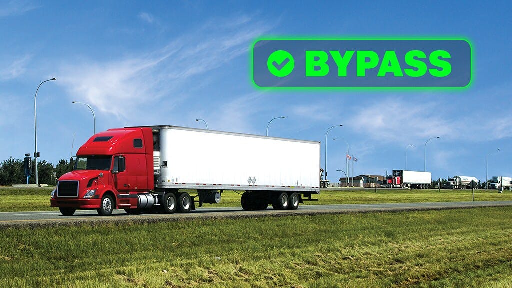 red semi truck leaving weight station