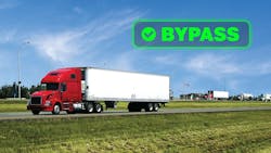 red semi truck leaving weight station red semi truck leaving weight station