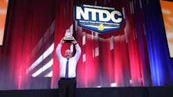 David Comings, FedEx Freight driver from North Dakota, holds the Bendix Grand Champion trophy at the 2025 National Truck Driving & Step Van Championships in Minneapolis. David Comings, FedEx Freight driver from North Dakota, holds the Bendix Grand Champion trophy at the 2025 National Truck Driving & Step Van Championships in Minneapolis.