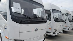 Row of ZM Trucks ZM8BEV electric trucks lined up after assembly, highlighting zero-emission commercial fleet options for urban and regional delivery. Row of ZM Trucks ZM8BEV electric trucks lined up after assembly, highlighting zero-emission commercial fleet options for urban and regional delivery.