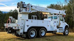 Altec D3000-22 distribution derrick mounted on a truck chassis, showcasing its heavy-duty boom and utility body designed for efficient pole setting and material handling. Altec D3000-22 distribution derrick mounted on a truck chassis, showcasing its heavy-duty boom and utility body designed for efficient pole setting and material handling.
