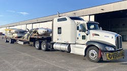 The 14-ton aircraft took three separate hauls to get it to the landing pads, where it's currently being reassembled. The 14-ton aircraft took three separate hauls to get it to the landing pads, where it's currently being reassembled.