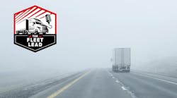 semitruck driving into mysterious fog semitruck driving into mysterious fog