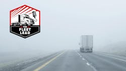 semitruck driving into mysterious fog semitruck driving into mysterious fog