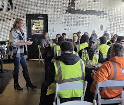 Corona speaking to a group of drivers Corona speaking to a group of drivers