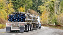 flatbed hauling metal pipes flatbed hauling metal pipes