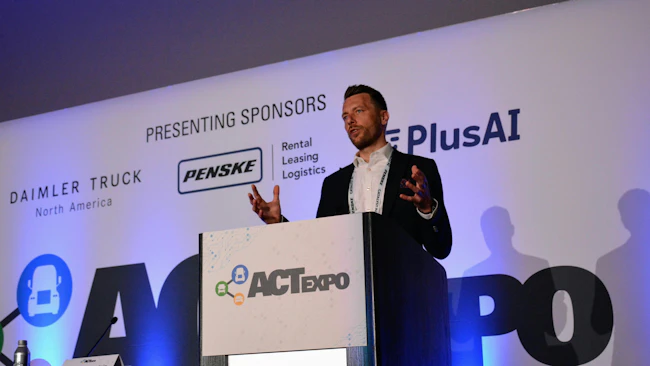 Lars Johansson, head of TTI Truck Technology at Volvo Group, speaks at a podium during a clean transportation market workshop at the ACT Expo.