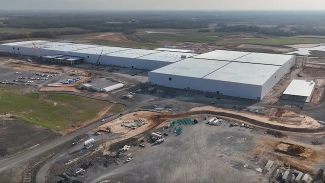 The aerial view shows the status of Amplify's plant as of late March.