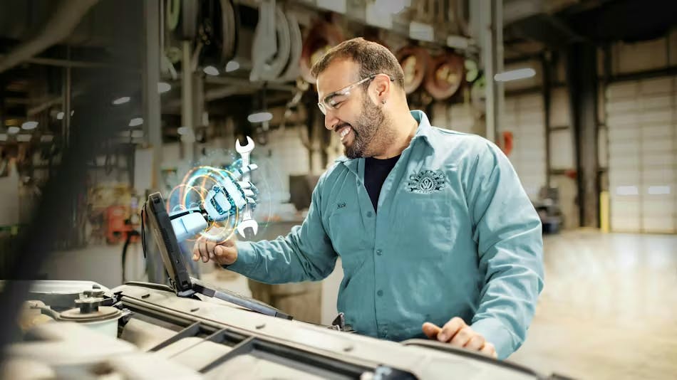 A truck maintenance technician using an advanced diagnostic device to analyze vehicle data in a garage bay, illustrating the application of AI for predictive maintenance and operational efficiency.