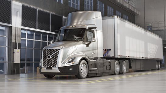 silver Volvo VNL Electric rendering in the facility