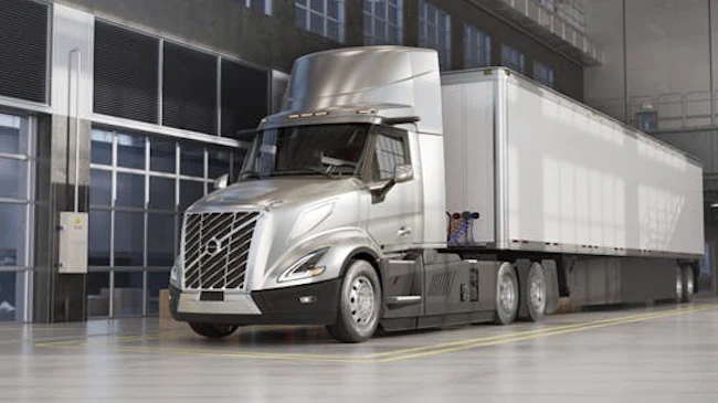 silver Volvo VNL Electric rendering in the facility