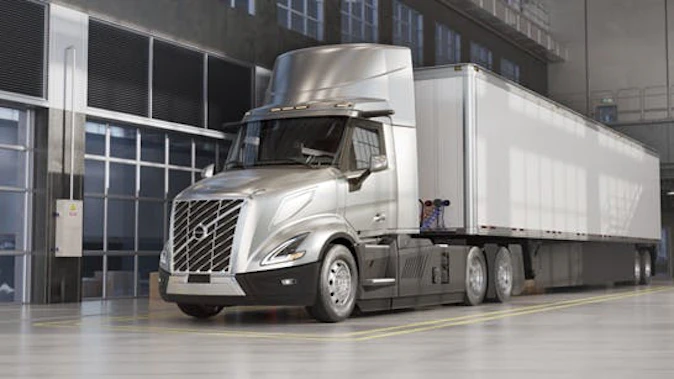 silver Volvo VNL Electric rendering in the facility
