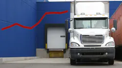 truck at loading dock with line chart
