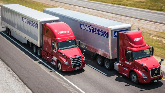 Two Averitt Express trucks on highway