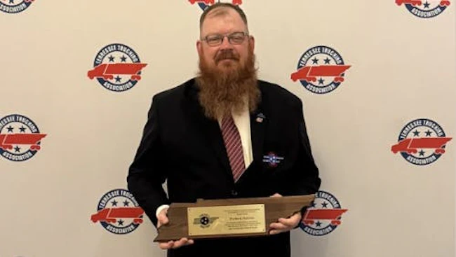 Patrick Fluegel recognized as TCA Highway Angel for rescuing trapped driver