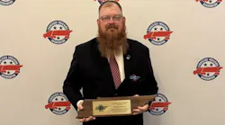 Patrick Fluegel recognized as TCA Highway Angel for rescuing trapped driver